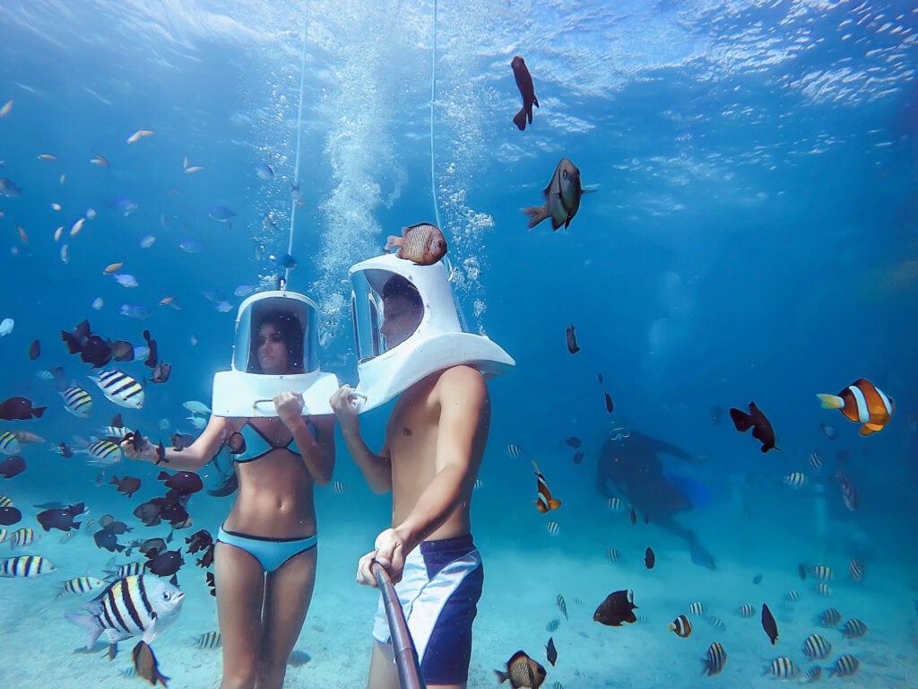 couple underwater selfie on gopro